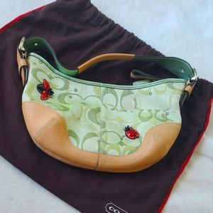 Coach green canvas with natural leather ladybug hobo purse